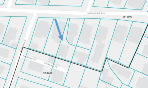 Google map with blue arrow pointing to a house